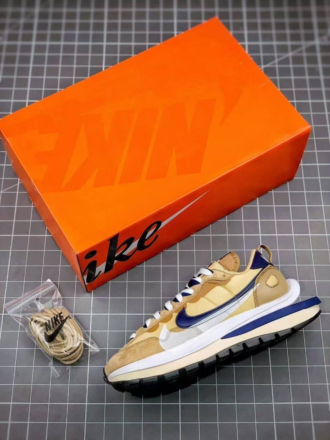 Sacai x Nike VaporWaffle sesame and blue void