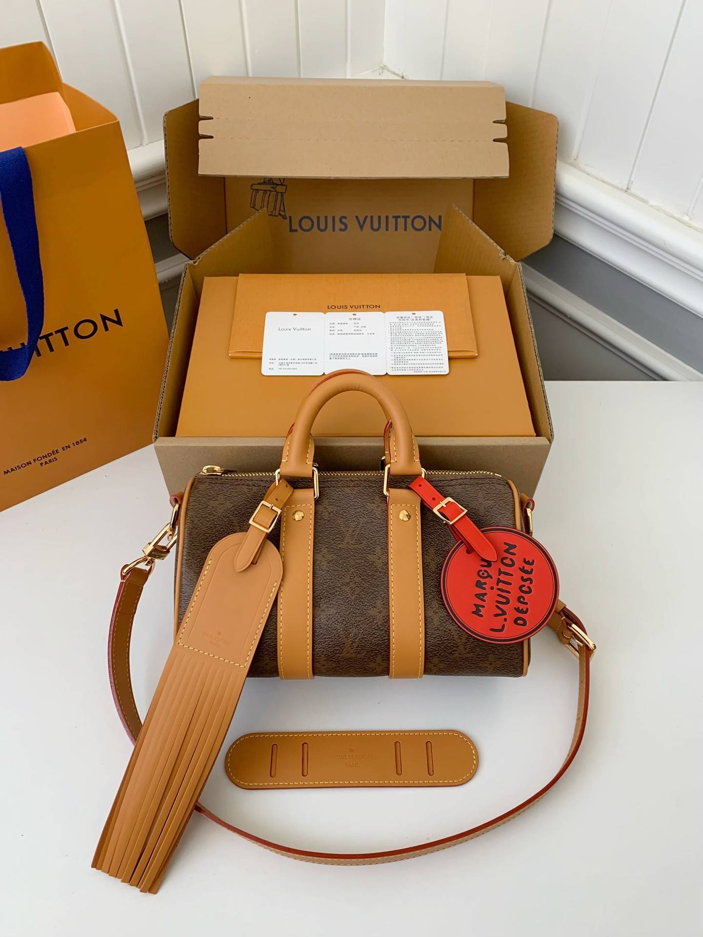 L*V The New Keepall Bandouli ère 25 handbag  M11542  Size：25*15*11cm