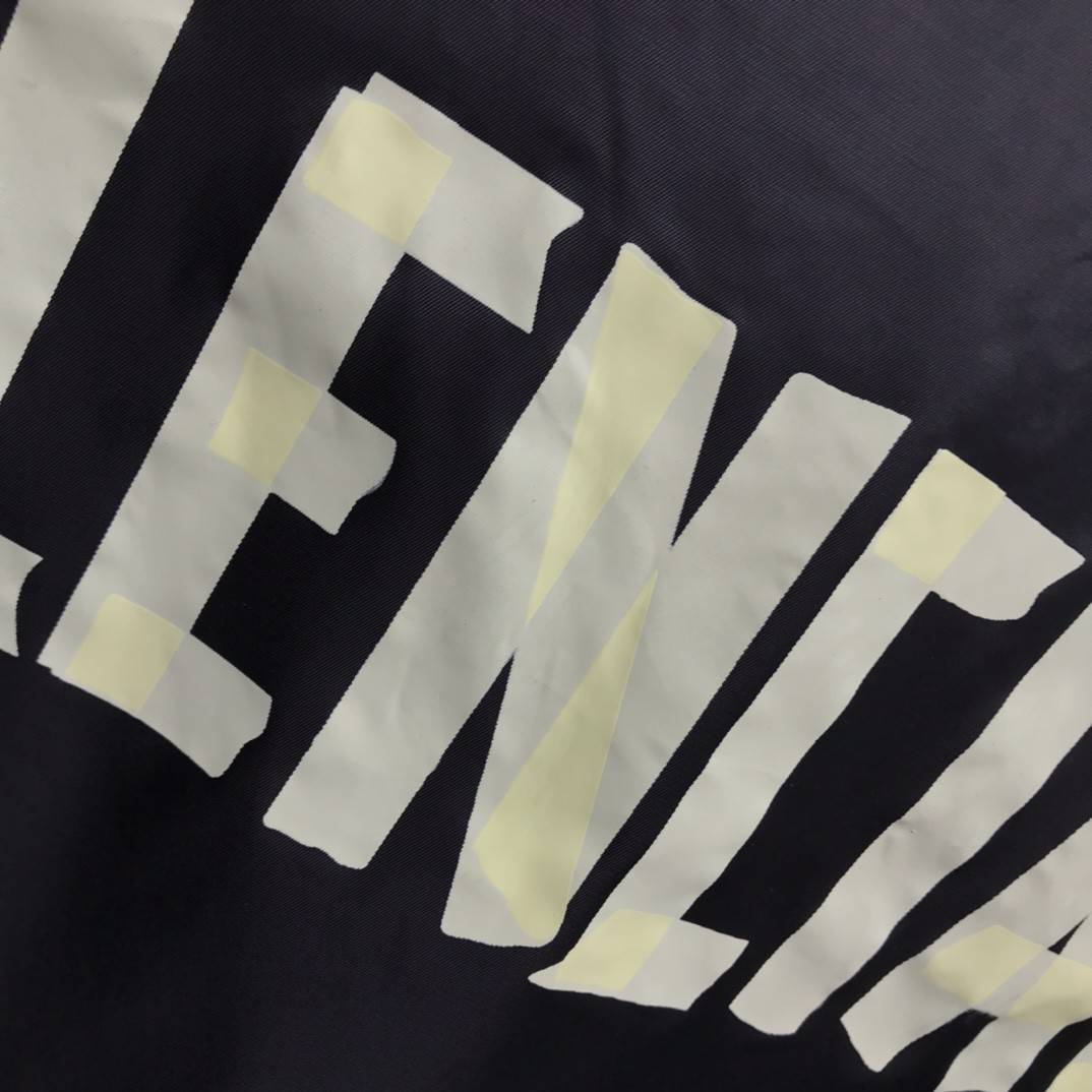 Balenciaga masking tape trench coat