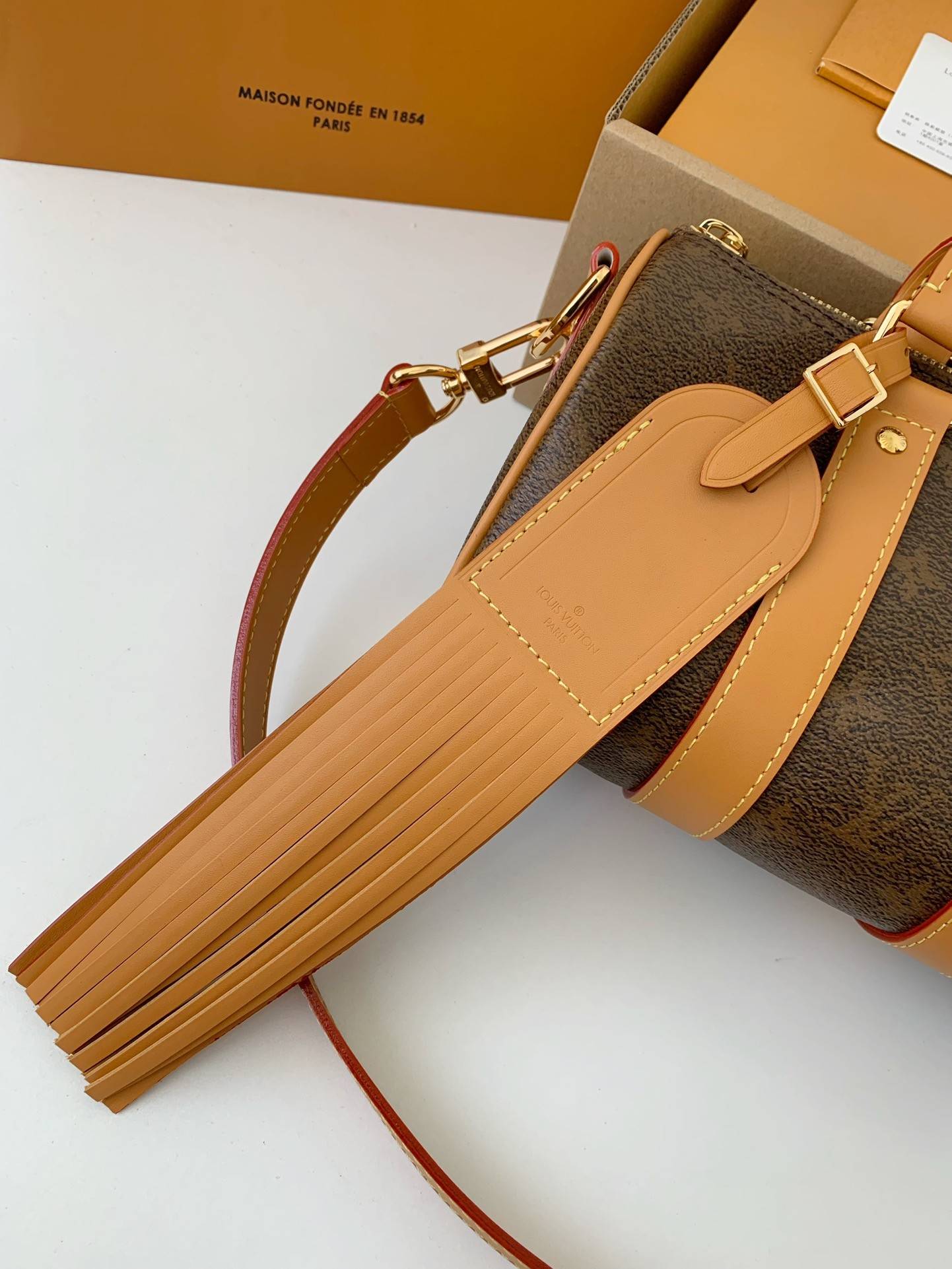 L*V The New Keepall Bandouli ère 25 handbag M11542 Size:25*15*11cm