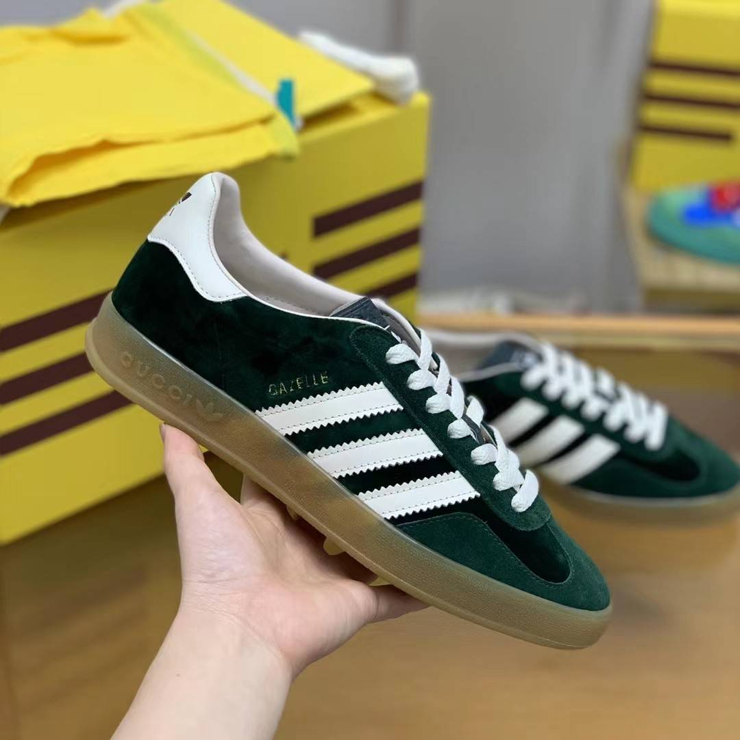 GU*I× Adidas sneakers