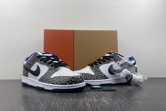 Supreme × Nike SB Dunk Low “White Cement 304292-001