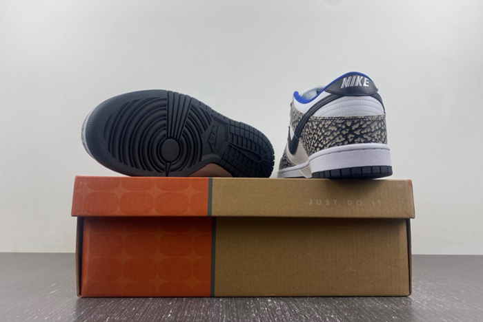 Supreme × Nike SB Dunk Low “White Cement 304292-001