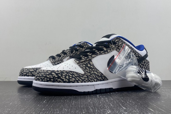 Supreme × Nike SB Dunk Low “White Cement 304292-001