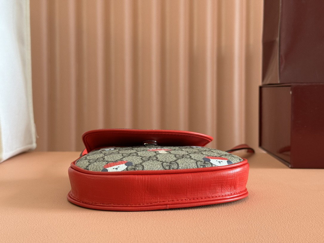 G*u*i children printed shoulder bag