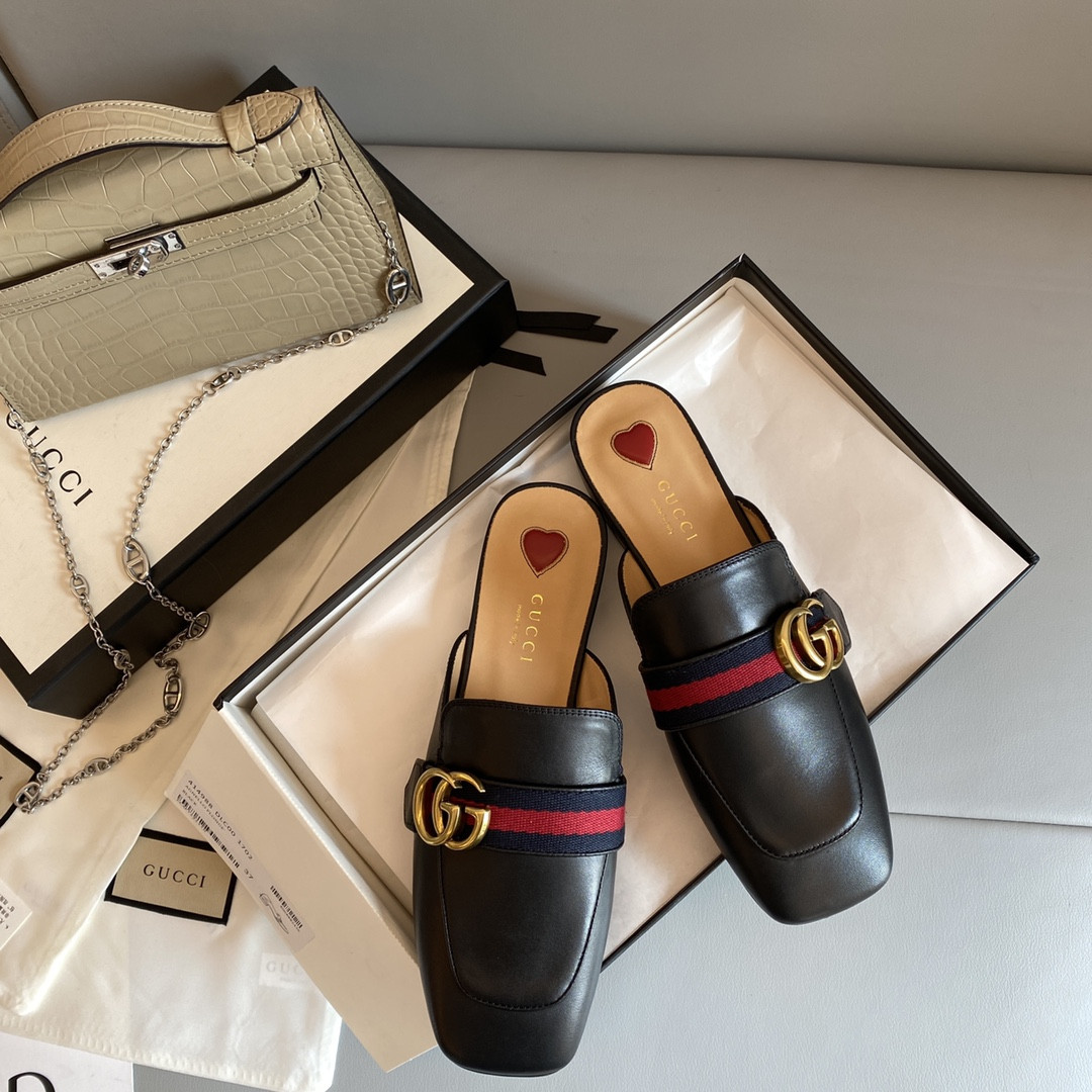 G*u*i leather slippers