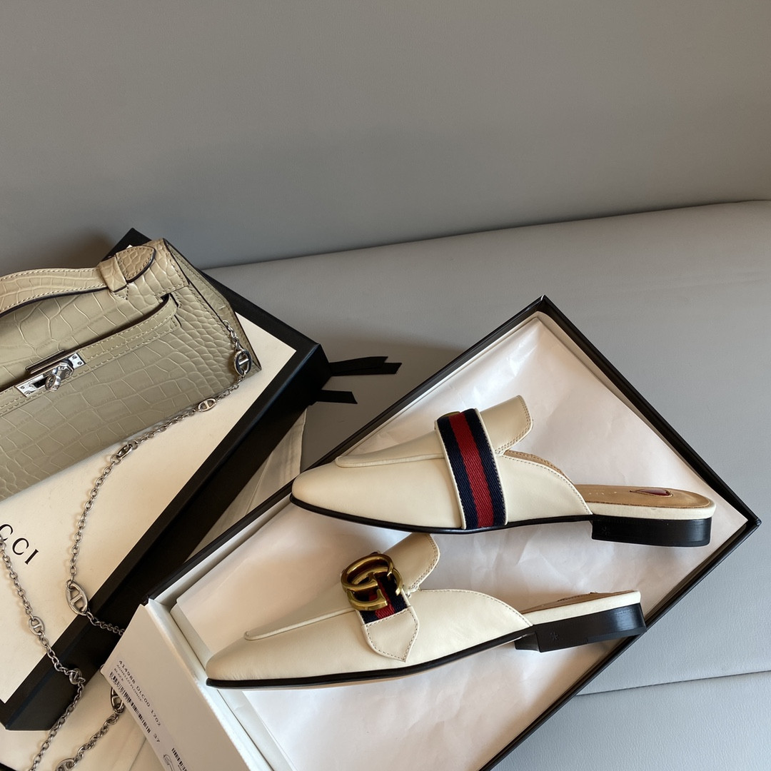 G*u*i leather slippers